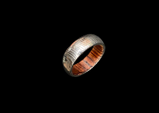 Hand-Forged Damascus Steel Ring with Natural Wood Inlay